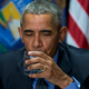 President Obama drinks filtered Flint water at a rally in Flint, MI.